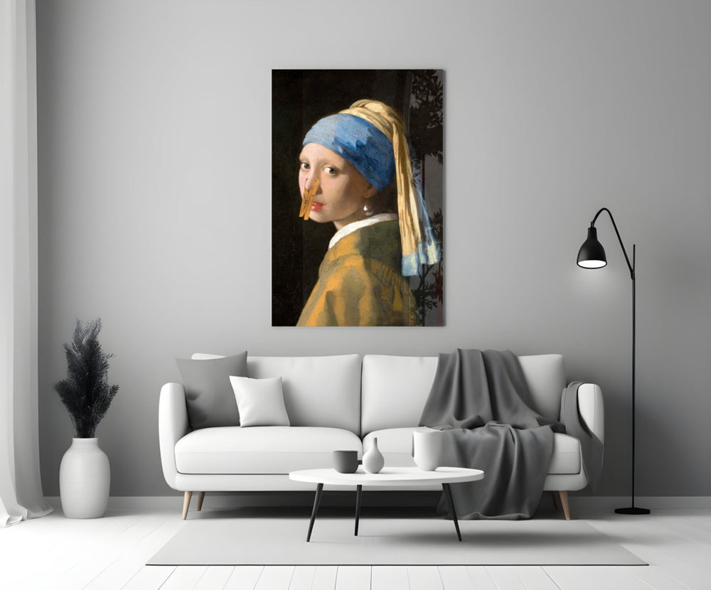Close-up detail of Vermeer girl with clothespin behind glass