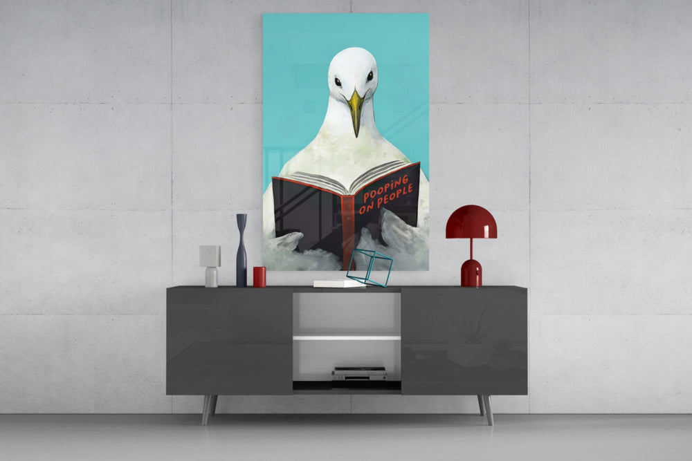 Wise Seagull teal glass wall art catching light to reveal its painted plumage