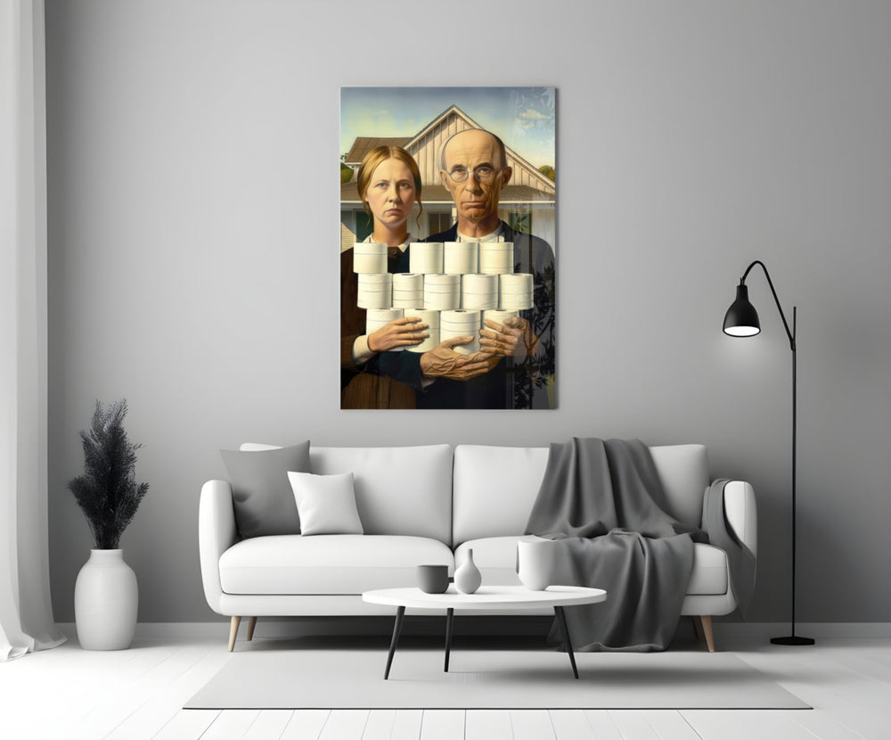 Close-up detail of American Gothic couple holding toilet paper rolls behind glass