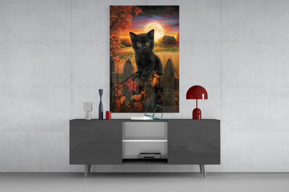 Autumn Cat glass wall art catching light to reveal its painted leaves
