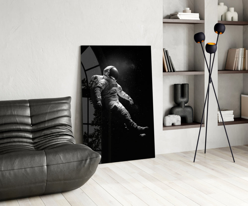 Astronaut panel anchoring a home office wall with minimalist focus