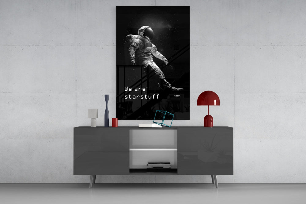 Loneliness in Space glass wall art catching light to reveal its painted nebula