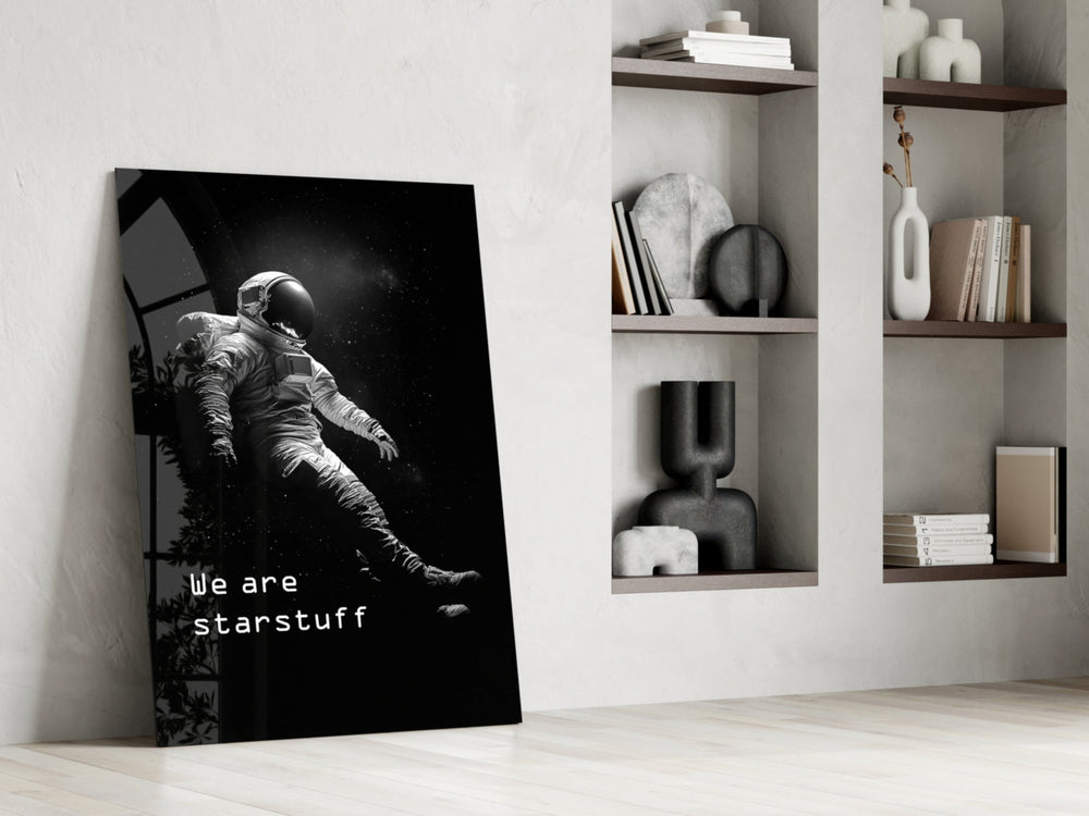 Astronaut panel against a moody dark-painted accent wall