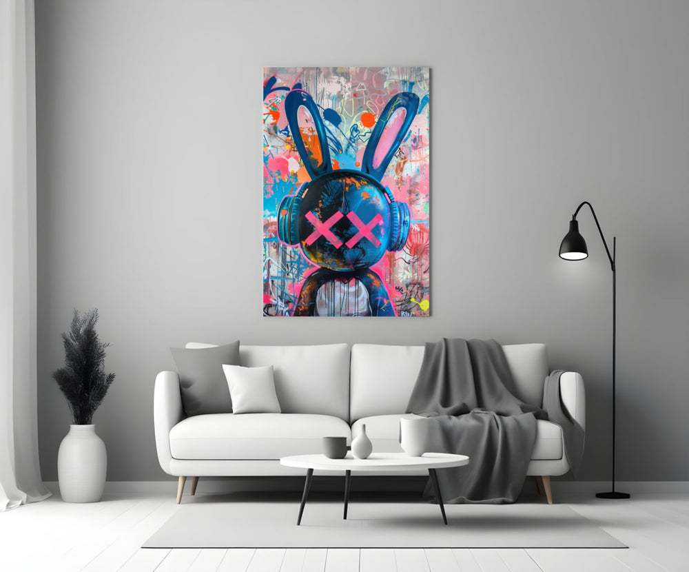 Close-up detail of graffiti rabbit with headphones behind glass