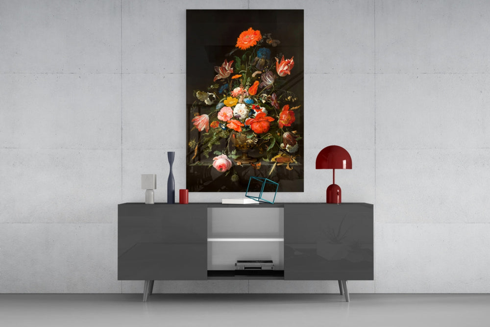 The Wealth in the Vase glass wall art catching light to reveal its painted blooms