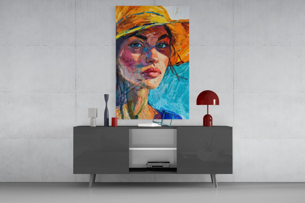 Woman in Orange Hat glass wall art catching light to reveal its painted impasto
