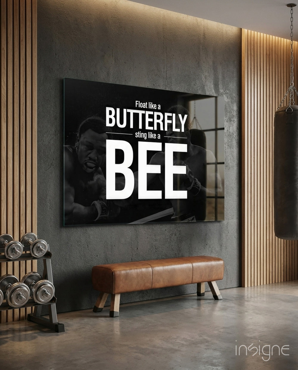 Muhammad Ali Butterfly Bee glass wall art in a modern home gym