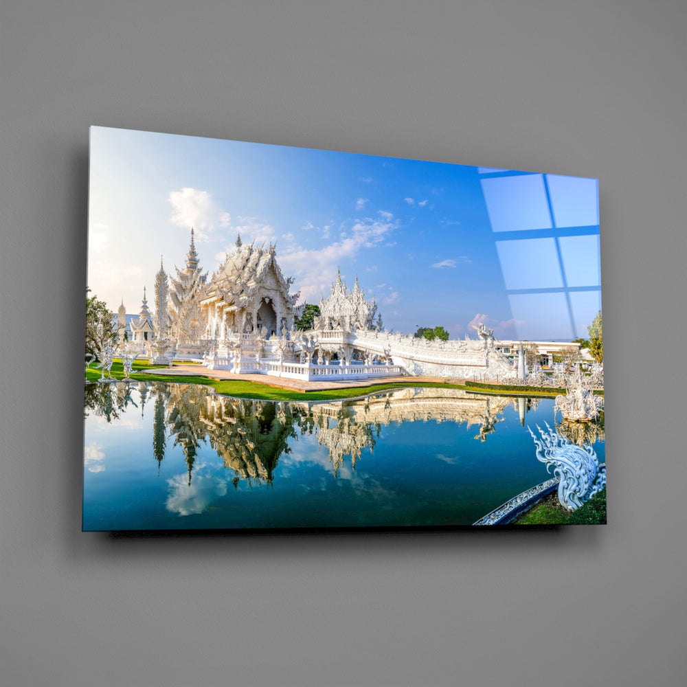 Thai sacred architecture pearl-white spires glass wall art over modern living-room sofa