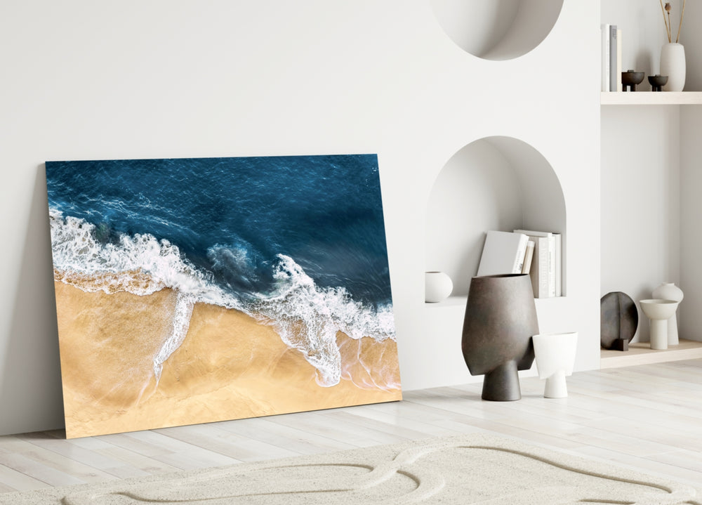Cinematic ocean foam top-down glass wall art above master headboard