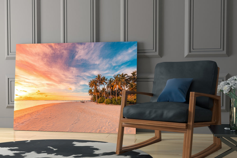 Coastal cinematic tropical glass wall art in light-filled lounge