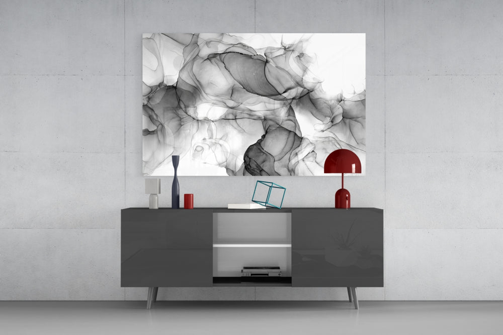 Translucent black-ink swirl glass wall art in luxury spa relaxation room