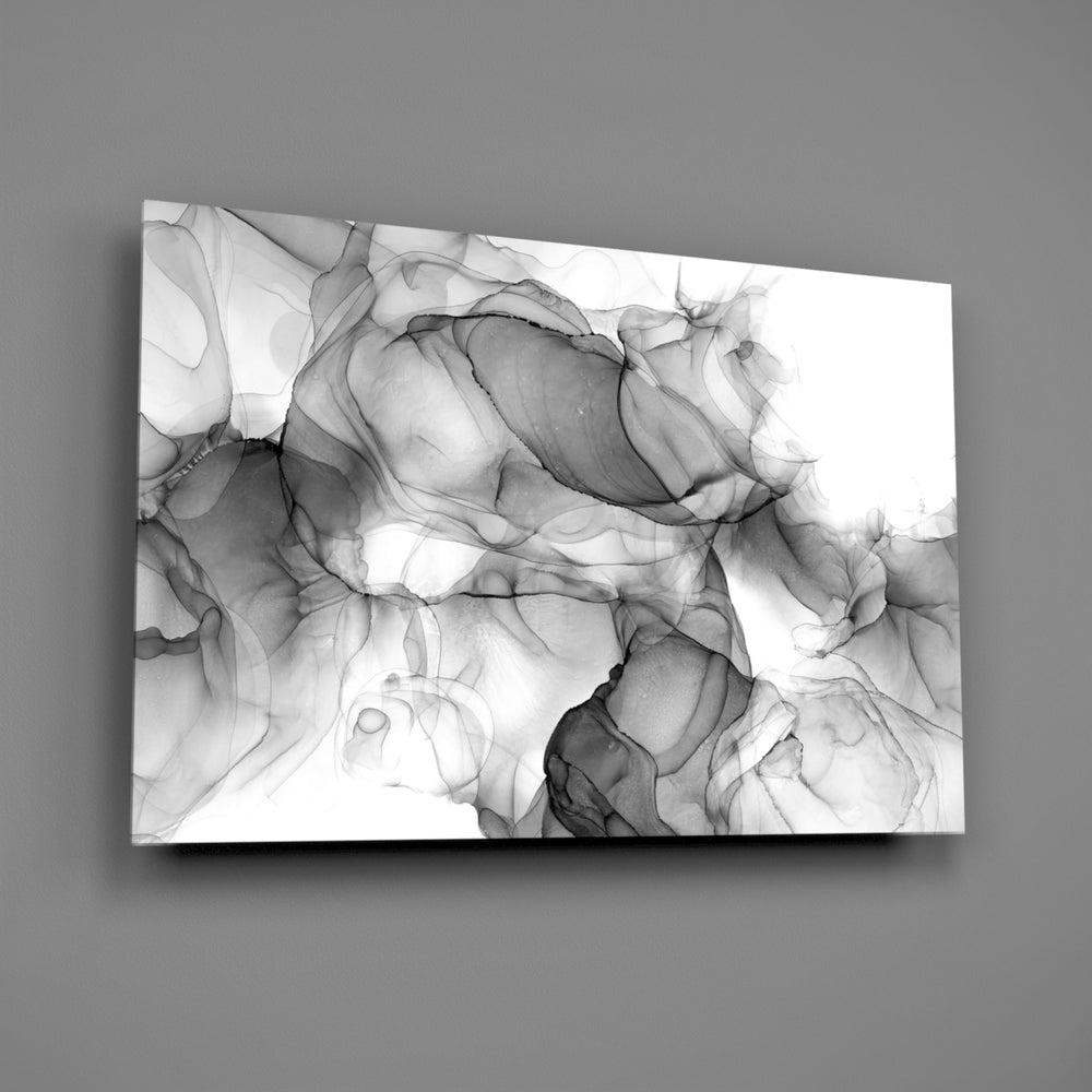 Pewter alcohol-ink monochrome glass wall art over walnut console in designer office