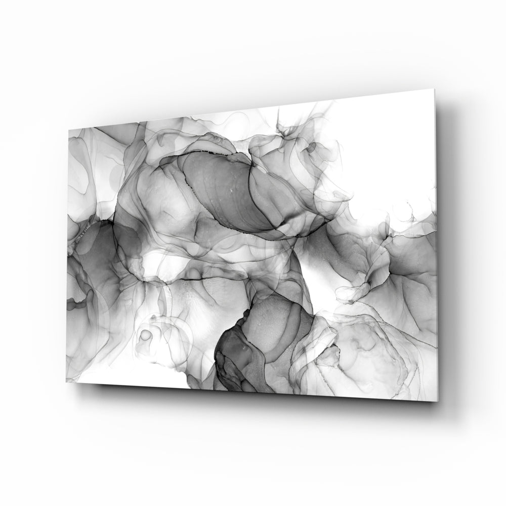 Black ink swirl minimalist glass wall art above ivory linen sofa in serene living room