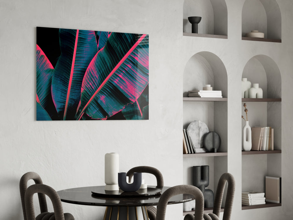Magenta banana-leaf macro glass wall art over master-bedroom headboard
