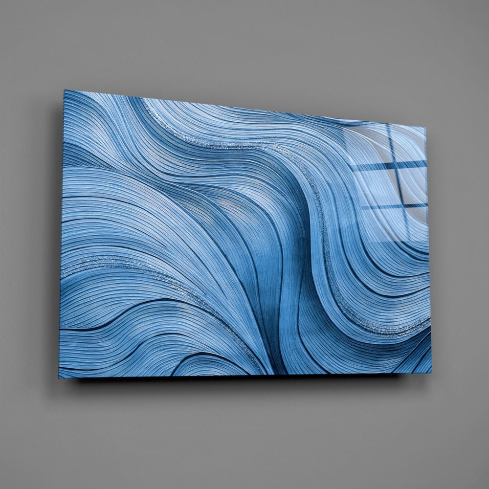 Blue quilling-style abstract glass wall art over walnut console in designer office