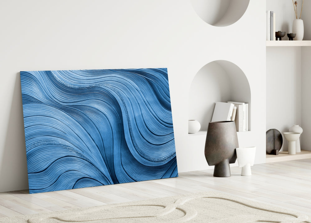 Sapphire-and-silver wave abstract glass wall art in calm dining room