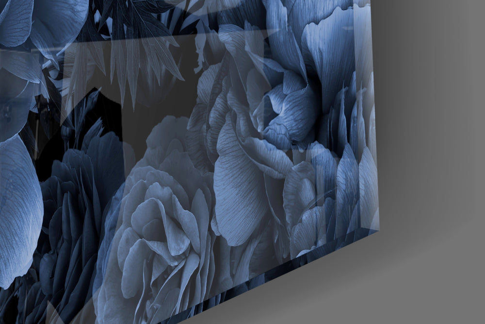Indigo-on-black rose bouquet glass wall art in boutique-hotel suite