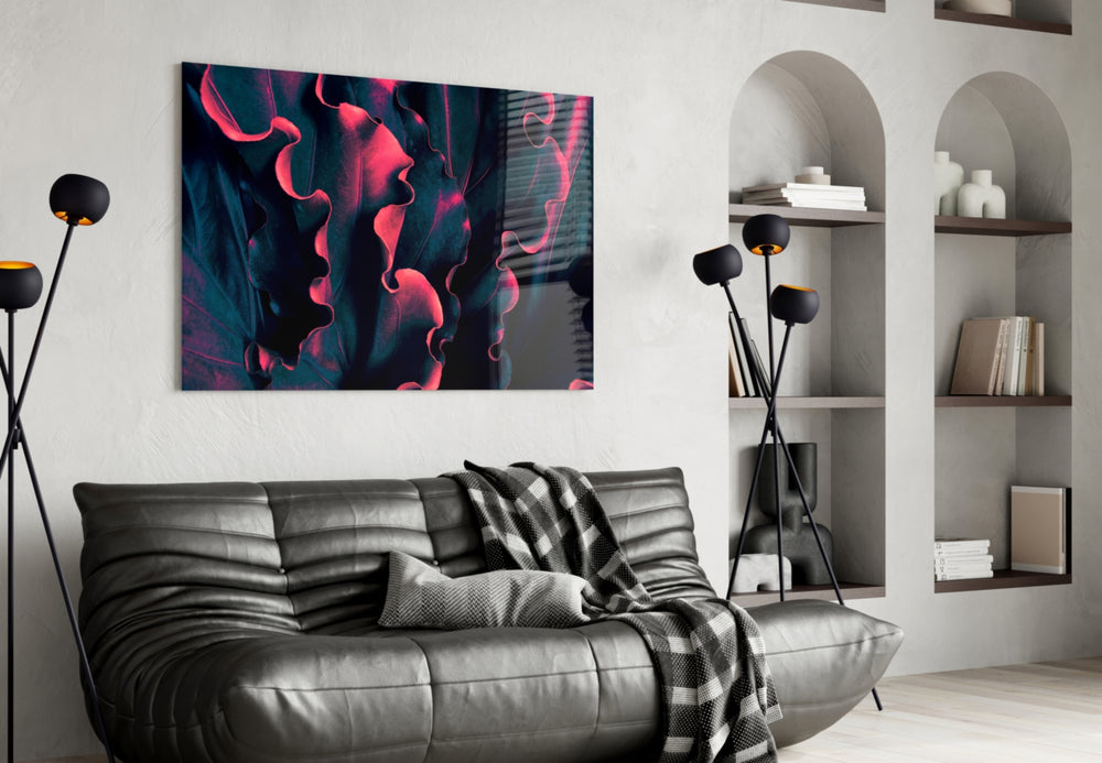 Coral spill-light leaf glass wall art over walnut bar cabinet