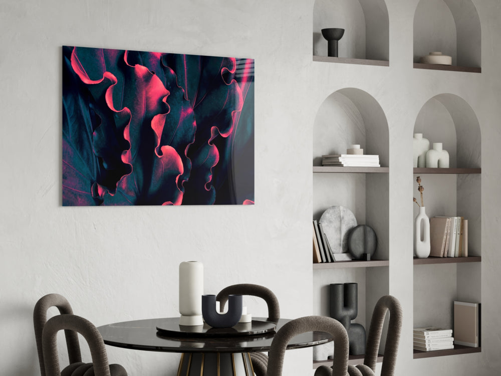 Charcoal-and-pink leaf cinematic glass wall art over master-bedroom headboard