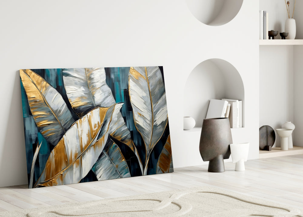 Teal-and-gold banana-leaf cinematic glass wall art over master-bedroom headboard