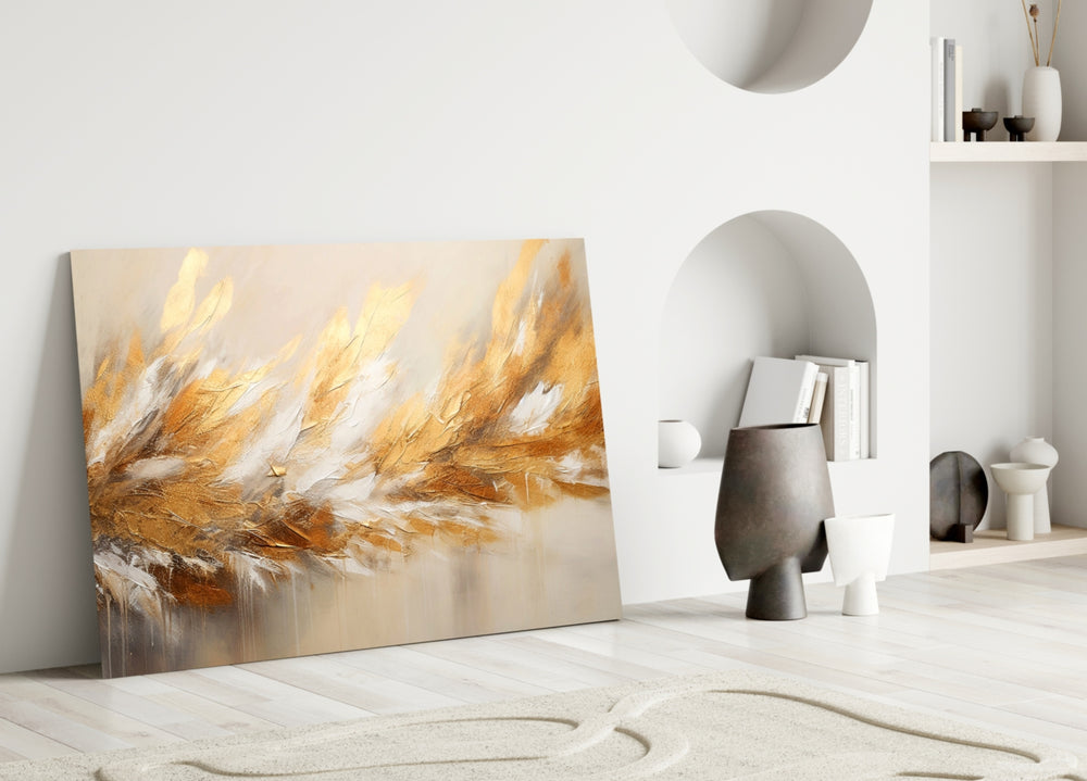 Painterly feather-and-gold cinematic glass wall art in boutique-hotel lounge