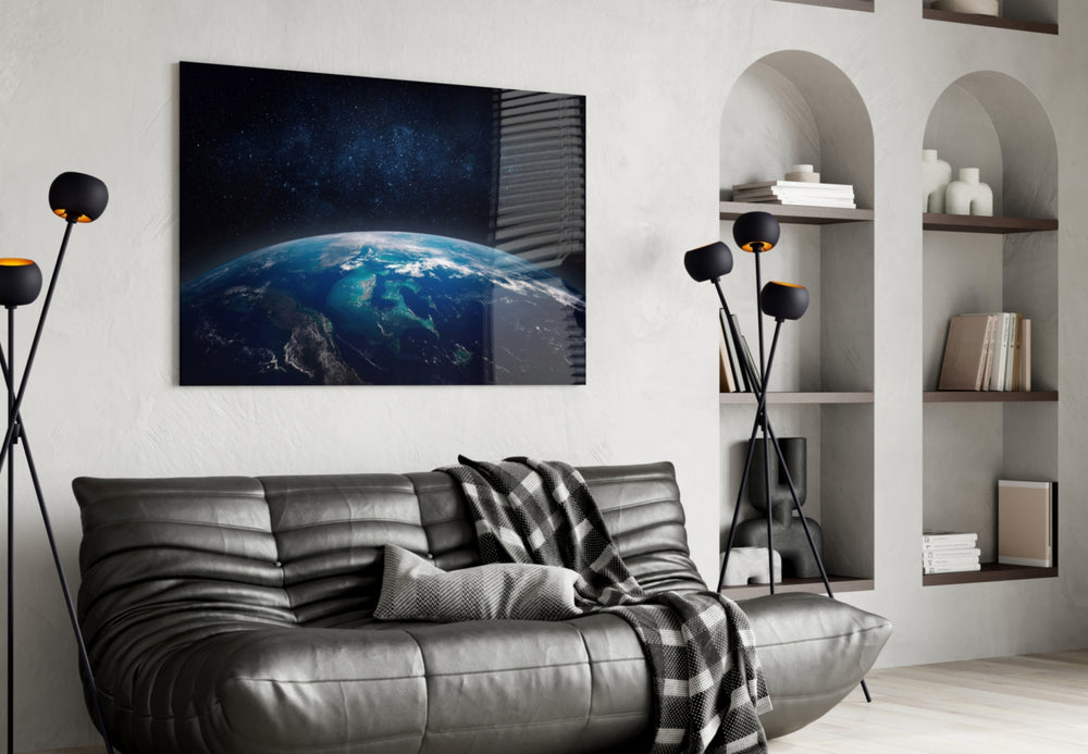 Earth-from-orbit horizon cinematic glass wall art over modern dining sideboard