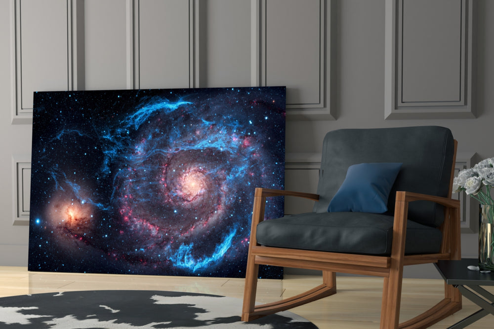 Cobalt-and-magenta galaxy glass wall art over modern dining sideboard