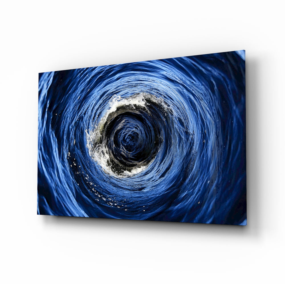 Ocean whirlpool vortex cinematic glass wall art above leather sofa in maritime study
