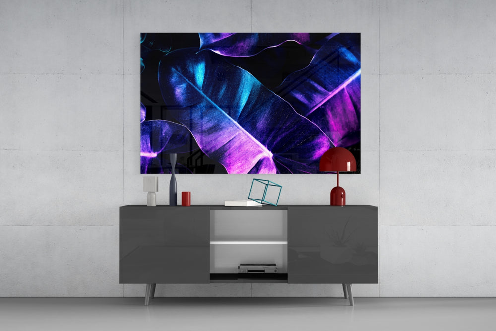 Stage-lit tropical leaf cinematic glass wall art in nightclub-style home bar