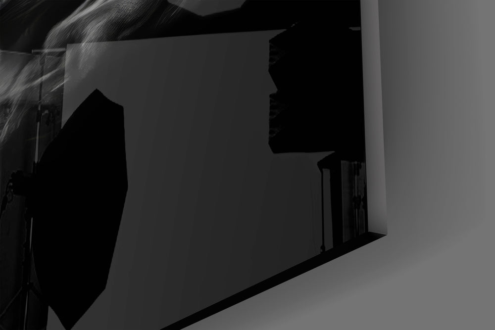 Smoke-face muse cinematic glass wall art in creative studio