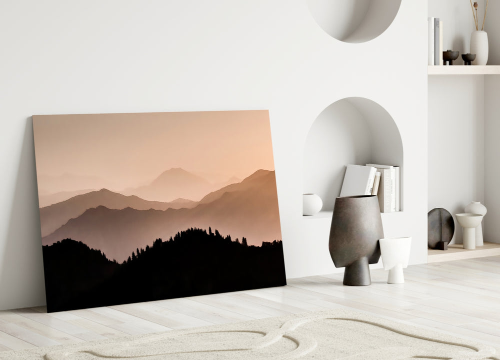Mountains glass wall art styled above a bed in a bedroom