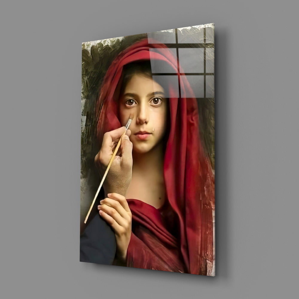 Close-up detail of crimson hood and brush at the eye