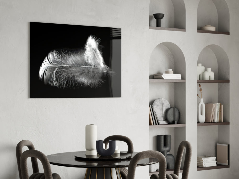 Feather glass print enhancing a meditation corner with quiet drama