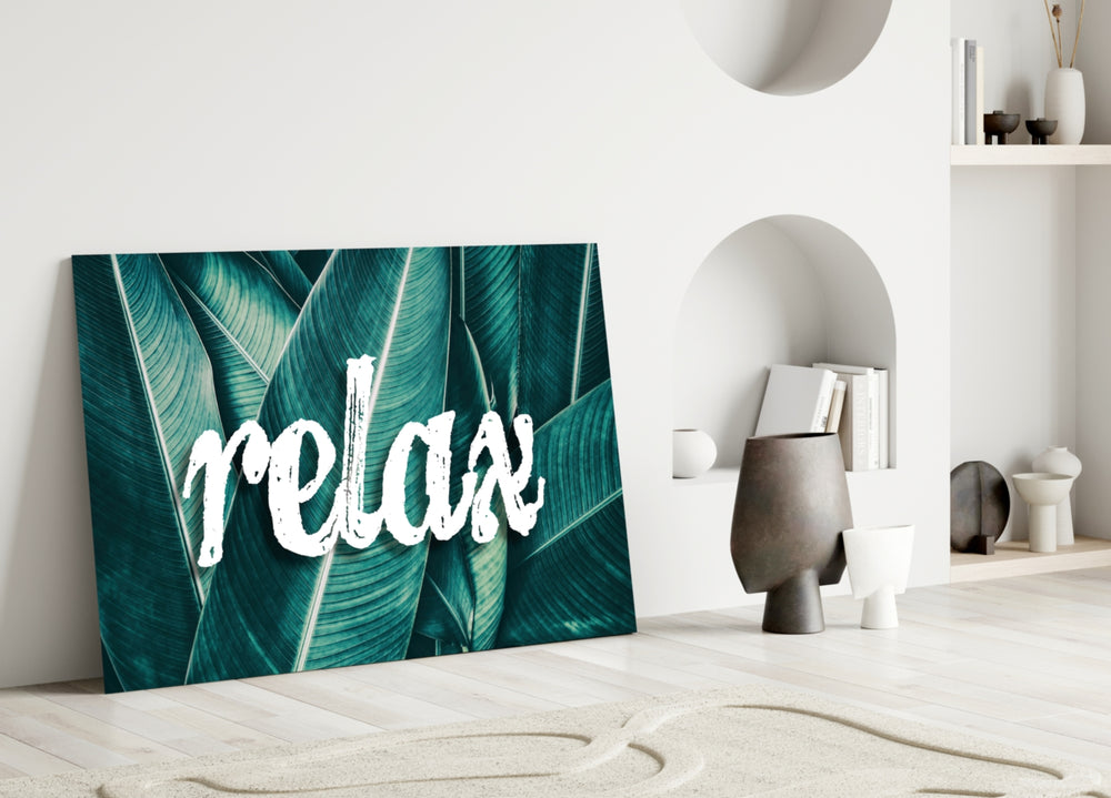 Relax glass wall art styled above a vanity in a powder room