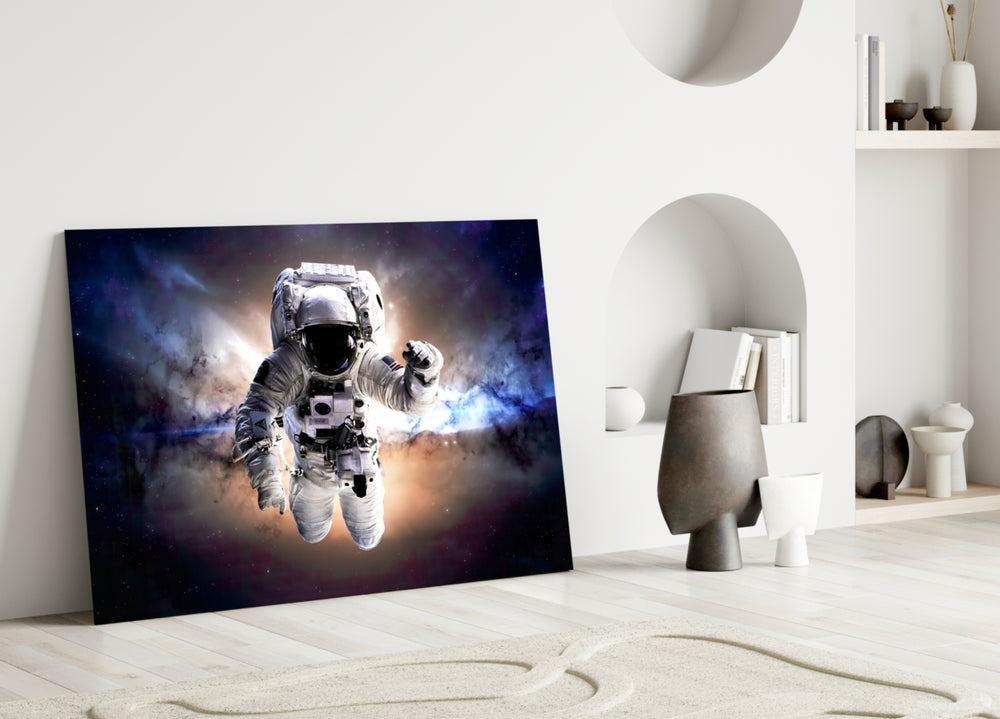 Astronaut glass wall art styled above a desk in a teen room