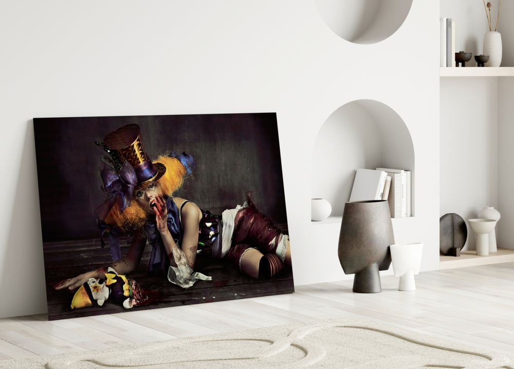 Hatter glass wall art styled above a desk in a creative office
