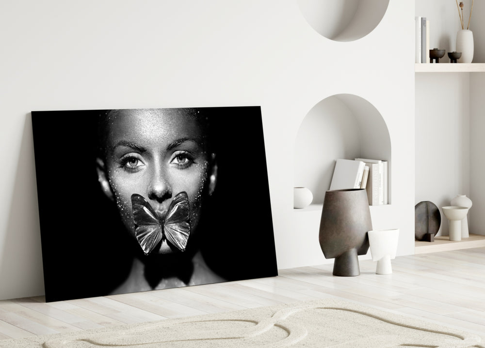 Butterfly Lips glass wall art styled above a vanity in a powder room