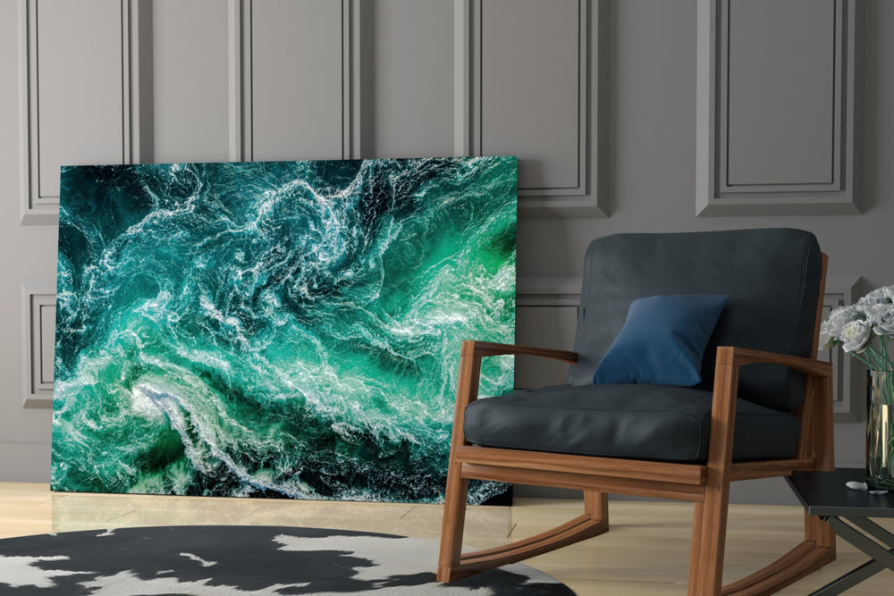Ocean artwork anchoring a wall with bold coastal palette