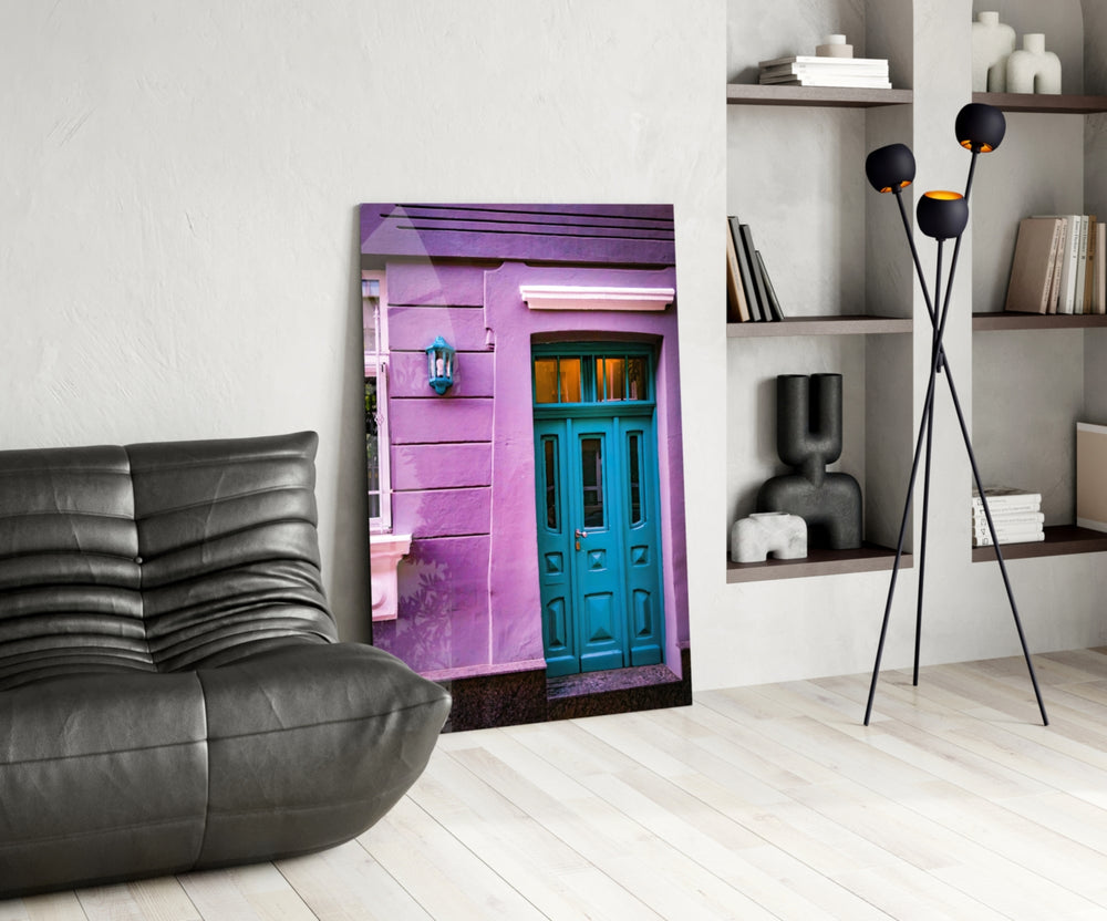 Blue Door glass print enhancing a guest room with editorial drama