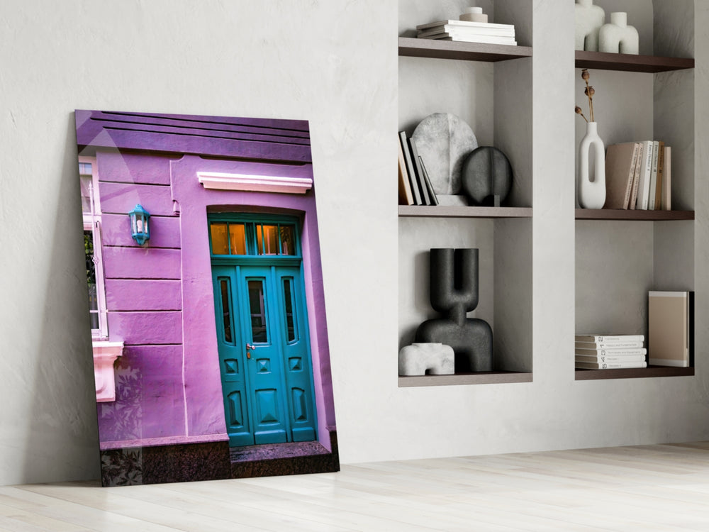 Blue Door artwork anchoring a wall with bold wanderlust palette