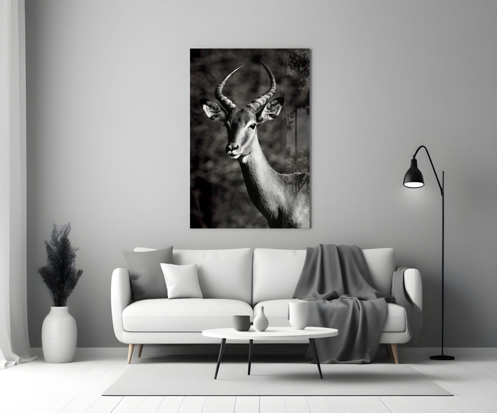 Impala glass wall art styled above a sideboard in a study