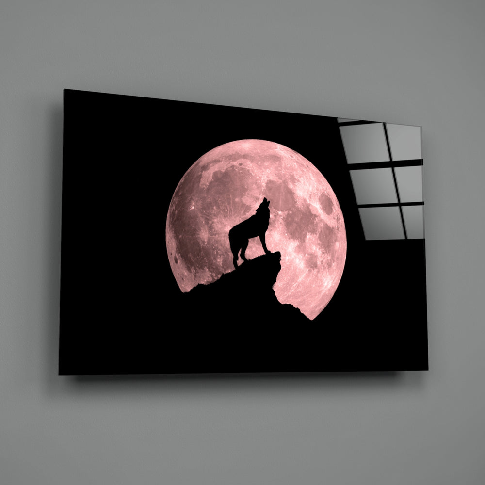 Close-up detail of wolf silhouette against rose-pink supermoon