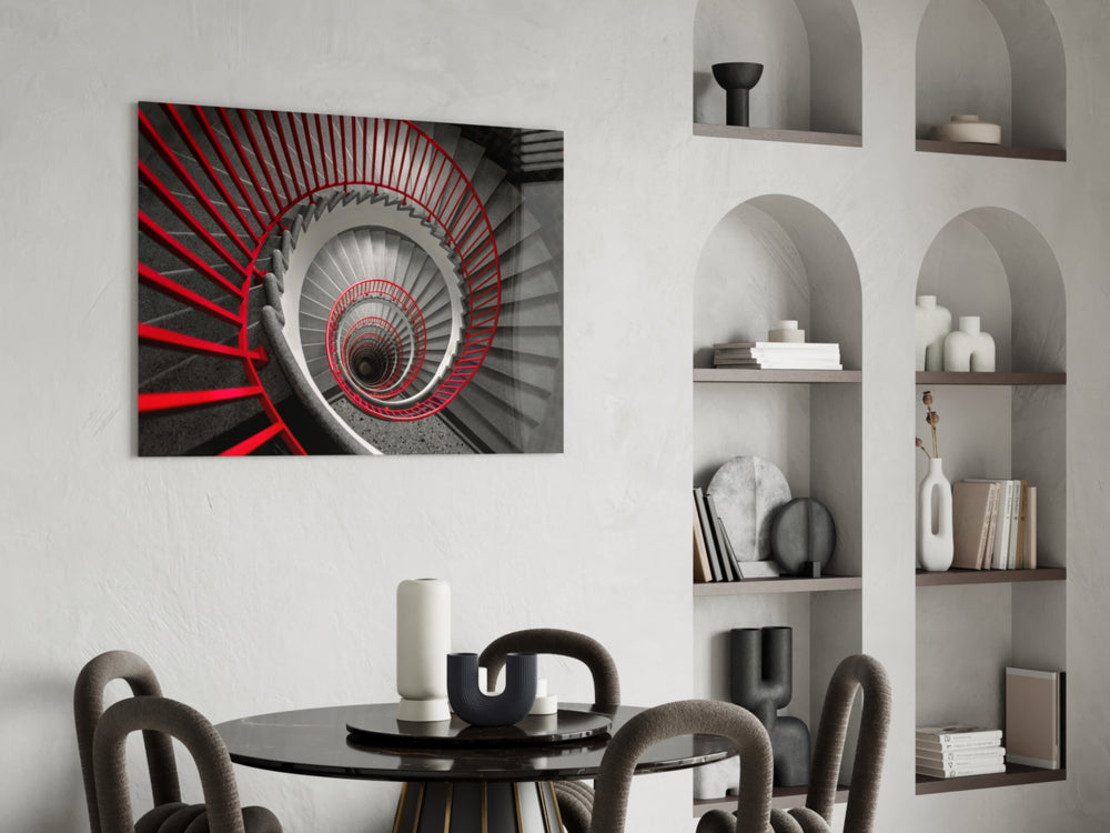 Red Spiral glass print enhancing a creative office with cinematic drama