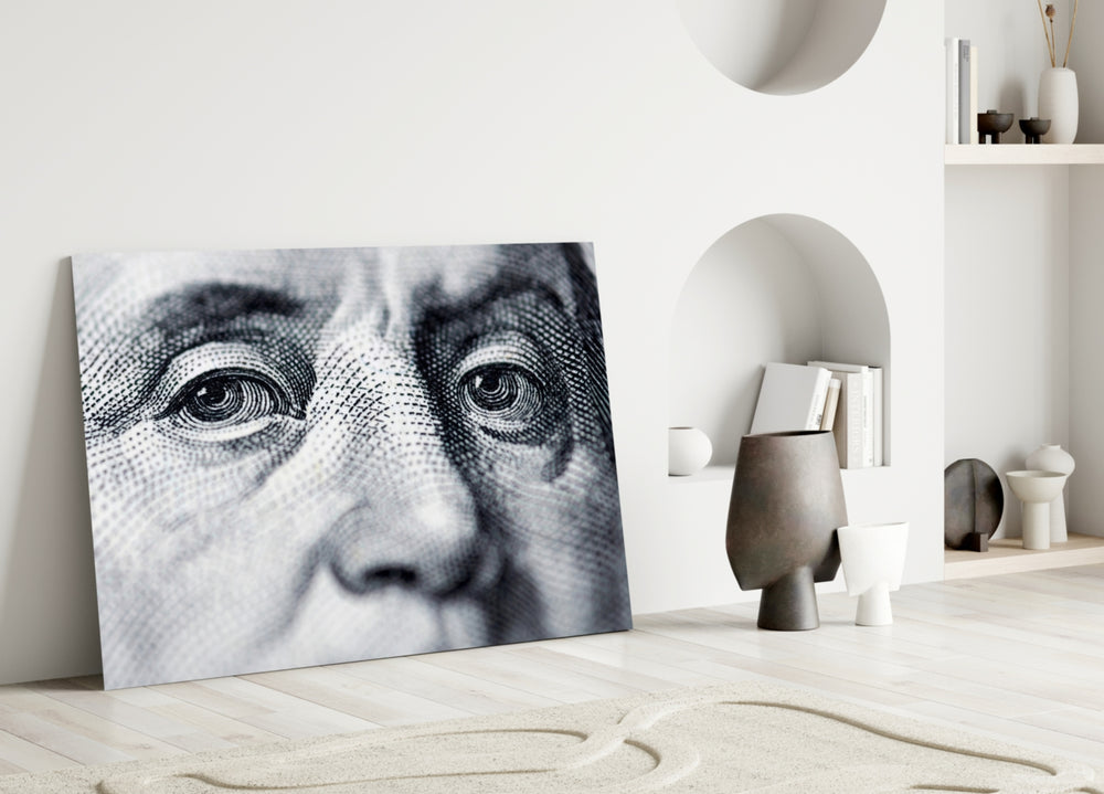 Franklin glass wall art styled above a desk in a man's office