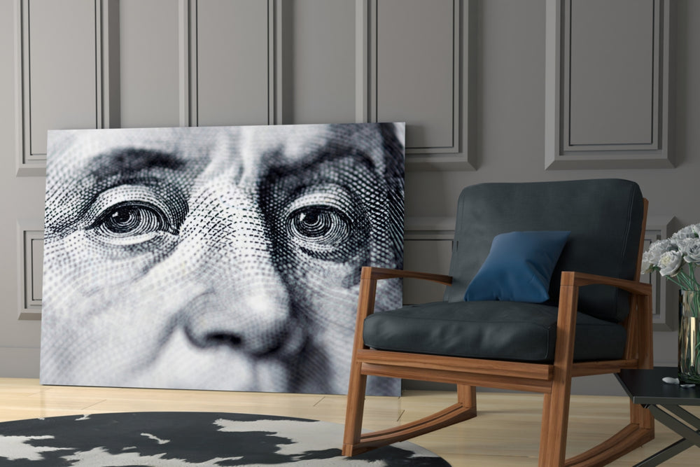Franklin artwork anchoring a wall with moody scholarly palette