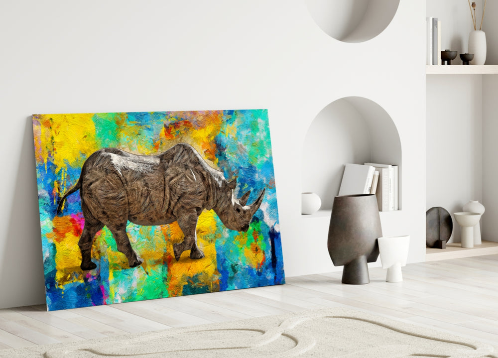Color Splash Rhino glass wall art styled above a desk in a man's office