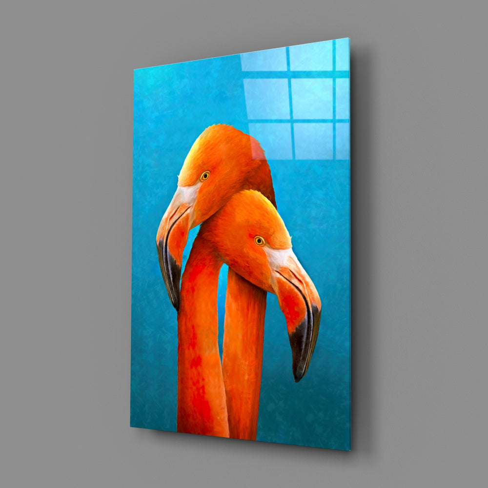 Close-up detail of coral plumage and inky eyes