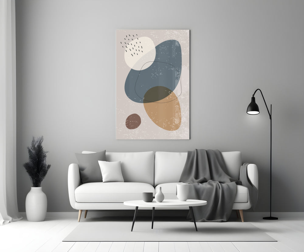 Pebble Stack glass wall art styled above a bed in a bedroom