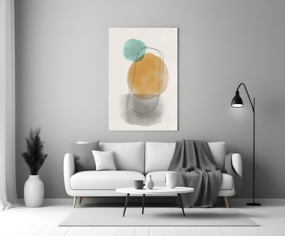 Sun And Moon glass wall art styled above a sofa in a living room