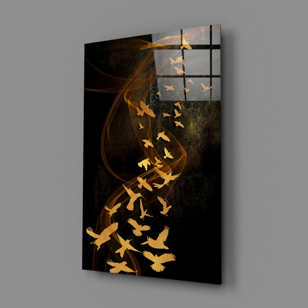 Close-up detail of gold wings rising through bronze smoke